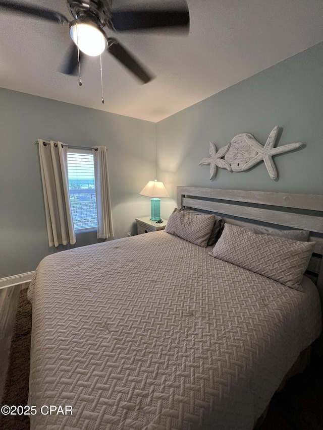 bedroom featuring ceiling fan