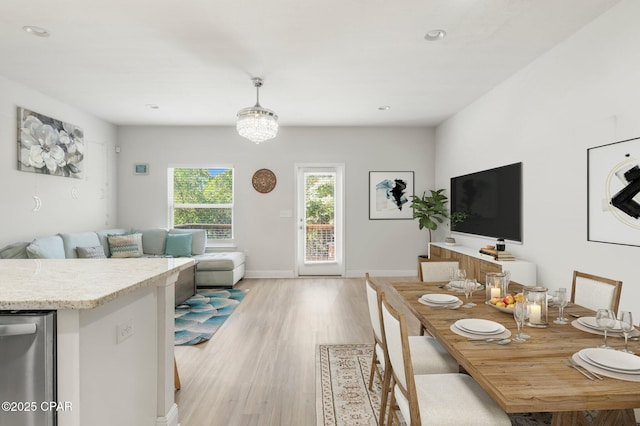 dining space featuring light hardwood / wood-style floors