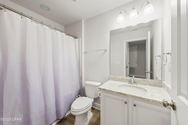 bathroom with a shower with curtain, vanity, toilet, and wood-type flooring