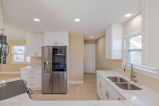 unfurnished bedroom with access to outside, multiple closets, light tile patterned floors, and an inviting chandelier