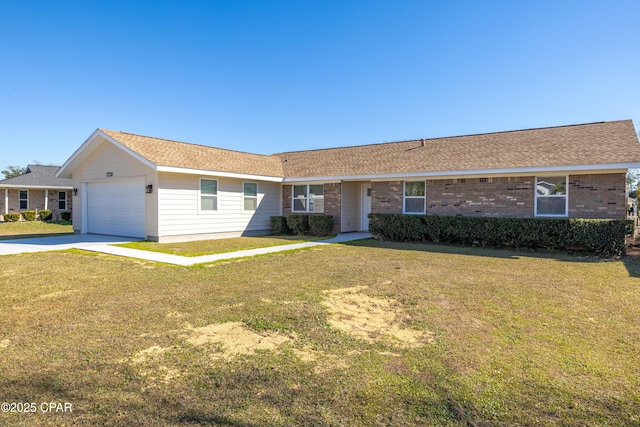 ranch-style home with a garage and a front lawn