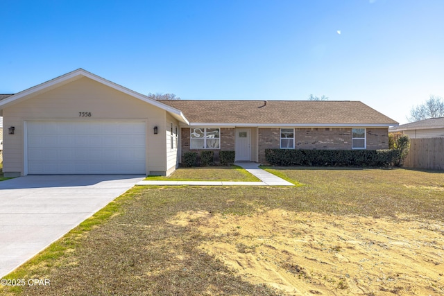 ranch-style house with a garage and a front yard