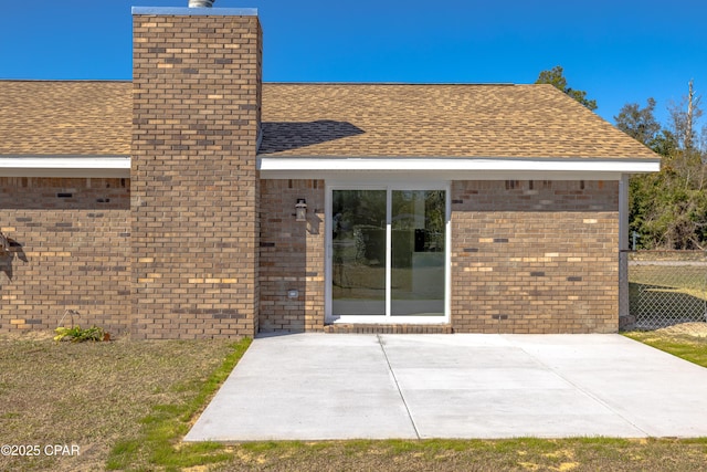 back of house with a patio