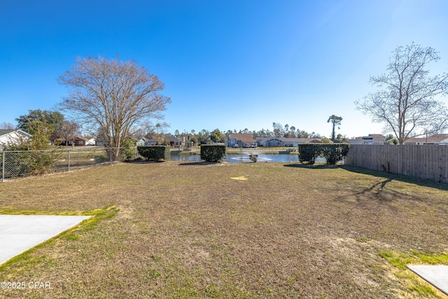 view of yard with a water view