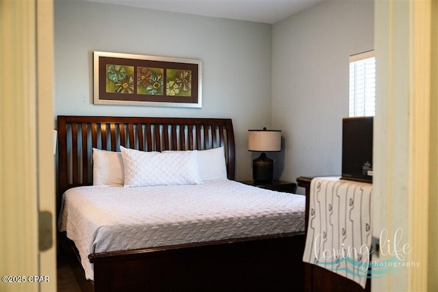 bedroom featuring radiator