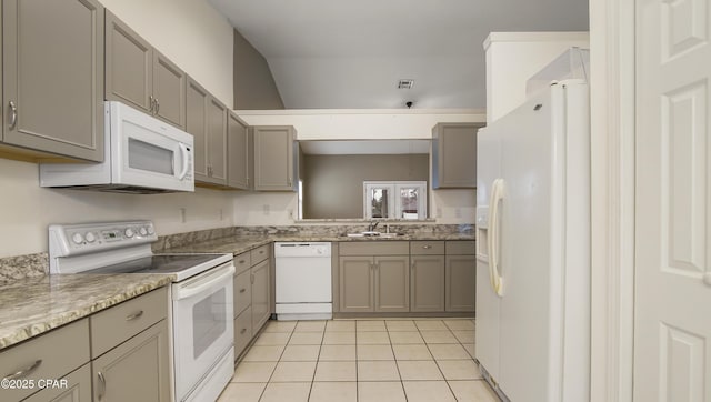 kitchen featuring sink, white appliances, gray cabinets, and light tile patterned flooring