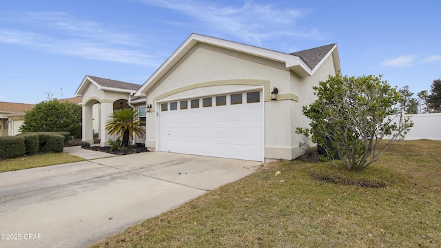 view of front facade featuring a front lawn and a garage