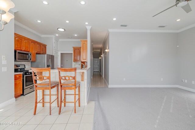 room details with built in shelves and a tile fireplace