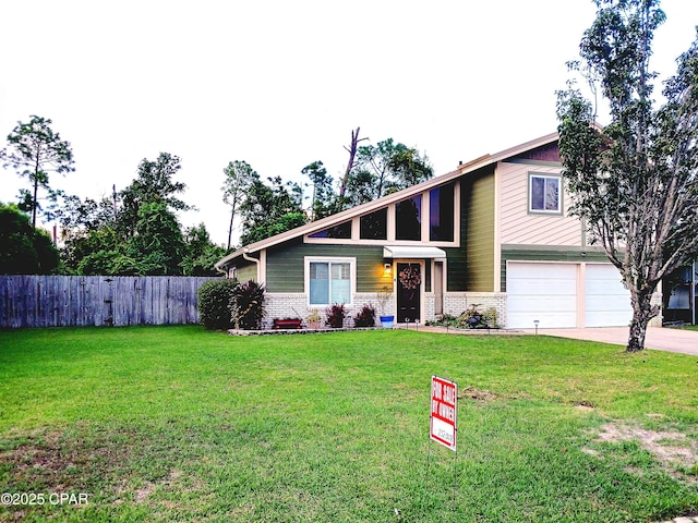 1114 Calabria Rd, Panama City, FL 32405 - view of front of property with brick siding, concrete driveway, and a garage