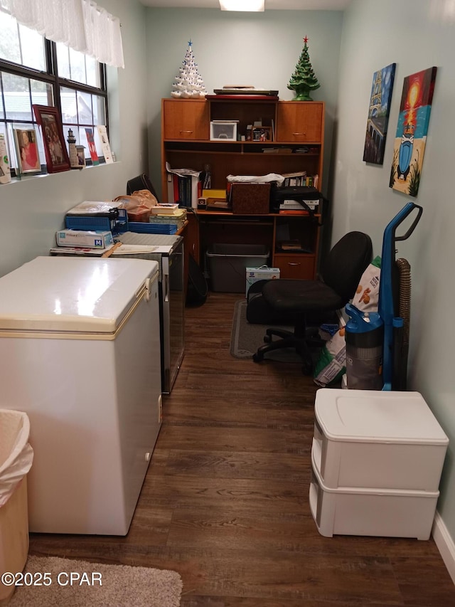 home office featuring dark hardwood / wood-style flooring