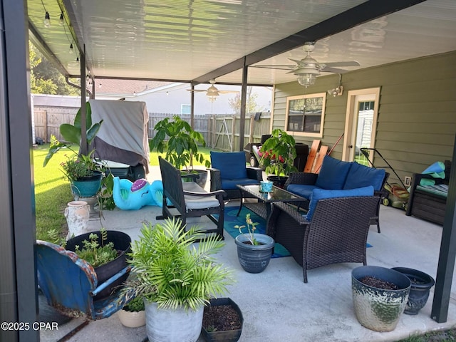 view of patio / terrace with ceiling fan and an outdoor hangout area