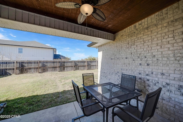 view of patio featuring ceiling fan