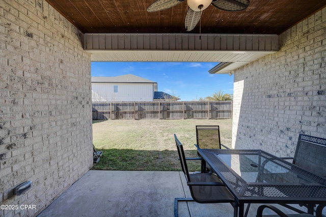 view of patio featuring ceiling fan