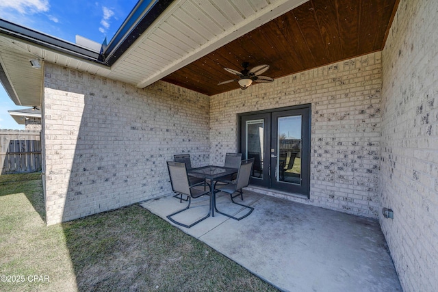 view of patio with ceiling fan and french doors