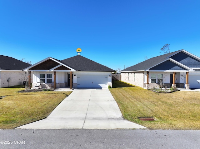 view of front of house with a garage and a front yard