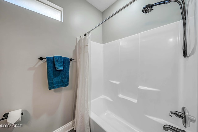 bathroom featuring shower / tub combo