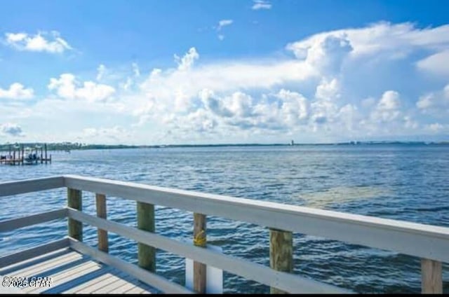 view of dock with a water view