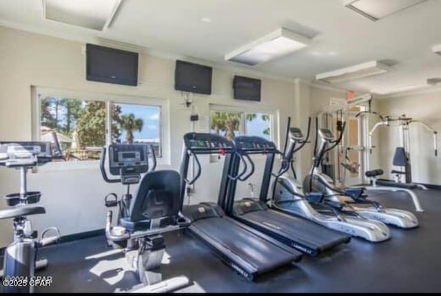 workout area with ornamental molding