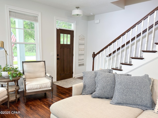 foyer entrance with hardwood / wood-style flooring