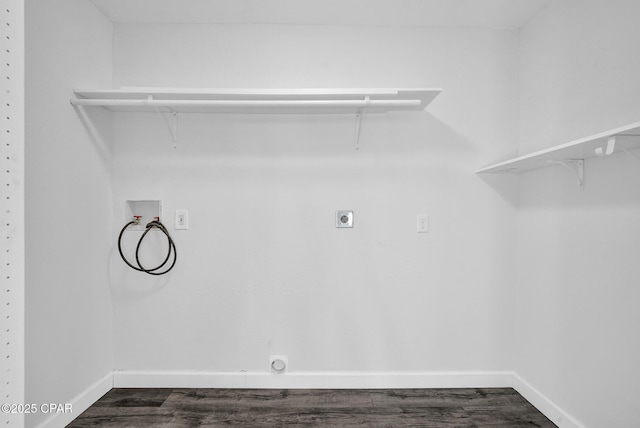 laundry room with hookup for a washing machine, dark hardwood / wood-style flooring, and electric dryer hookup