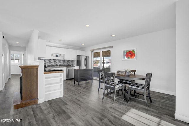 dining room featuring dark hardwood / wood-style flooring