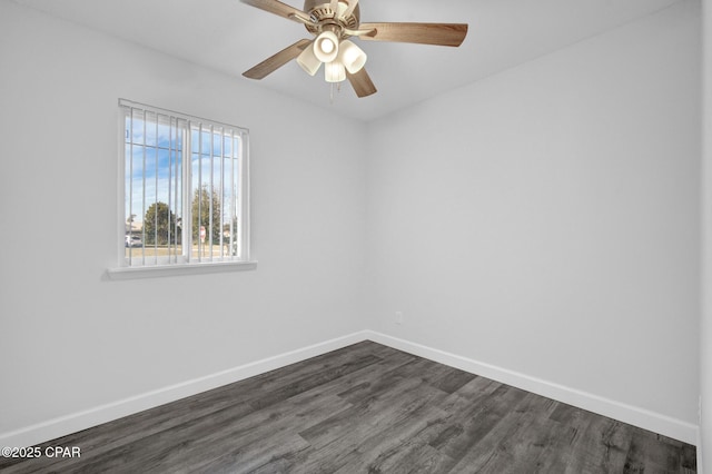 unfurnished room featuring ceiling fan and dark hardwood / wood-style flooring