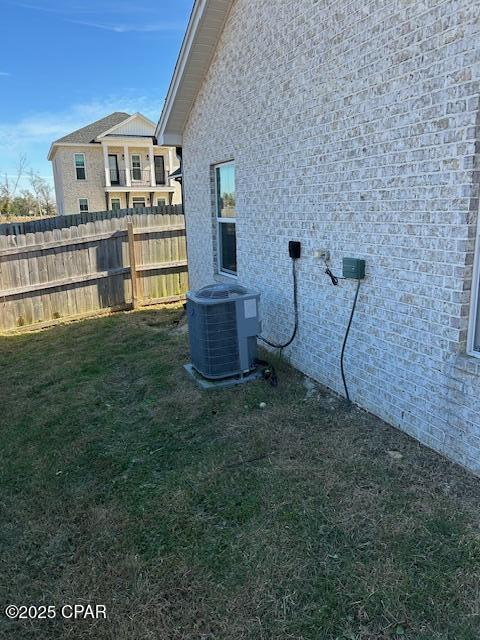 view of yard featuring central AC