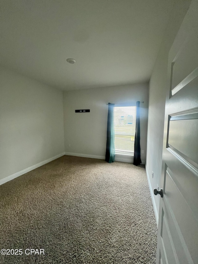 empty room featuring carpet