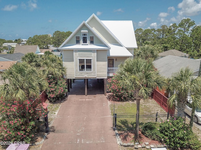 view of front of property with a carport