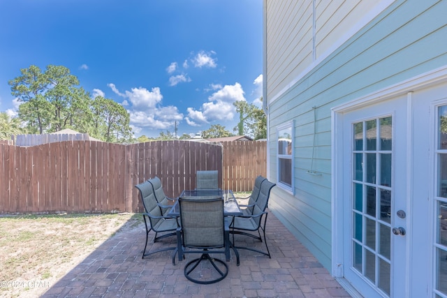 view of patio featuring french doors