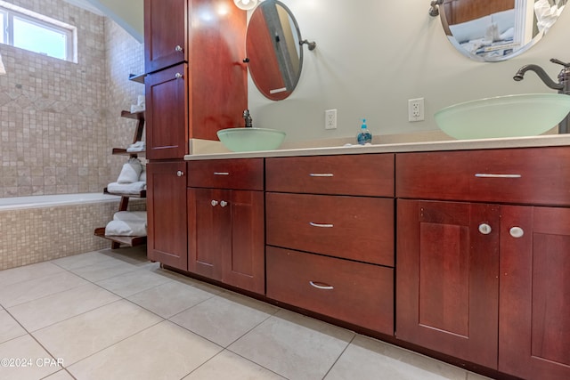 bathroom with tile patterned floors and vanity