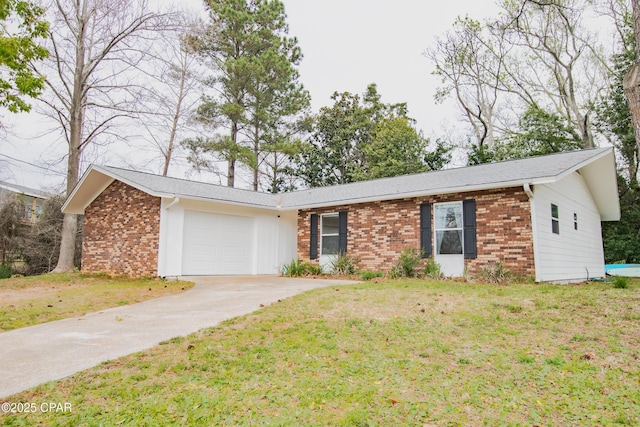 ranch-style home with a garage and a front yard