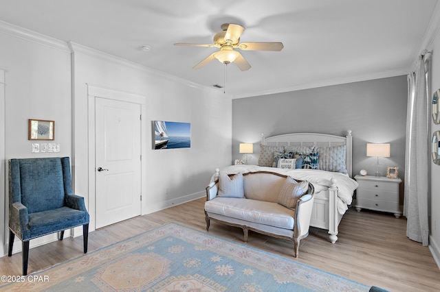 bedroom featuring ornamental molding, ceiling fan, and light hardwood / wood-style flooring