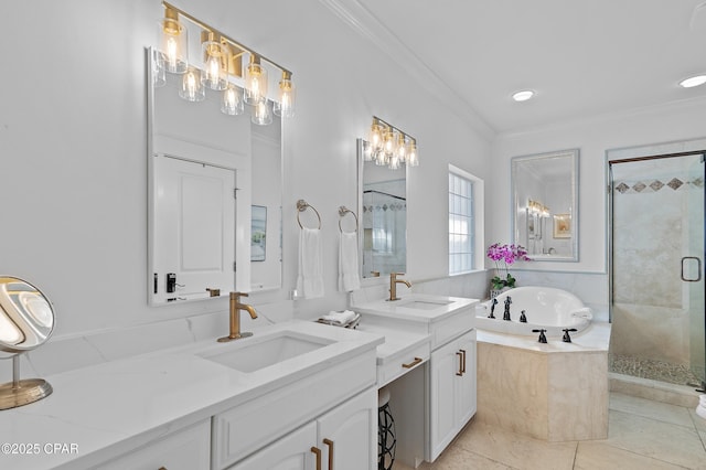 bathroom featuring vanity, crown molding, tile patterned floors, and shower with separate bathtub