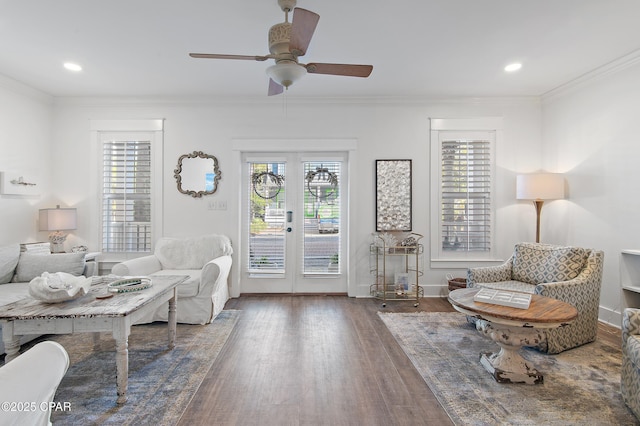 sitting room featuring french doors, ceiling fan, ornamental molding, and dark hardwood / wood-style flooring