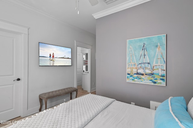 bedroom featuring ornamental molding and ceiling fan