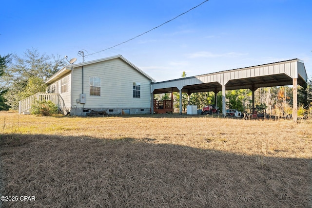 exterior space with a carport