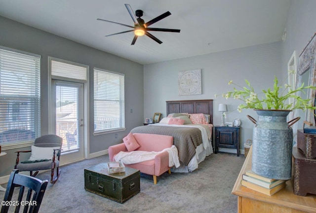 bedroom with ceiling fan, light colored carpet, and access to exterior