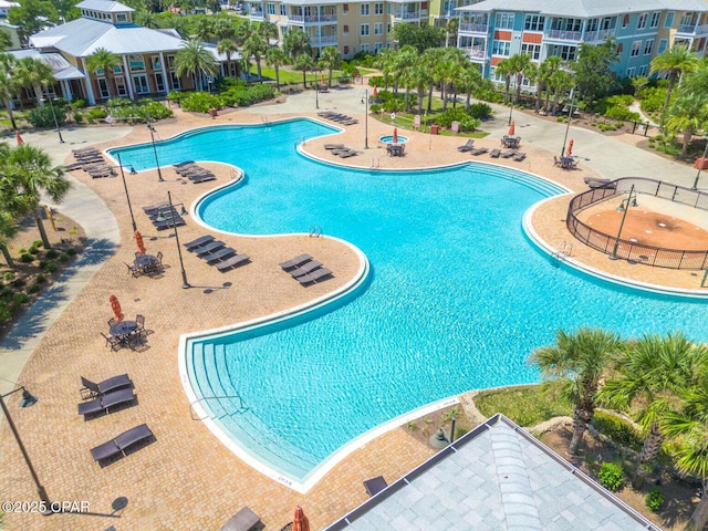 view of swimming pool featuring a patio area