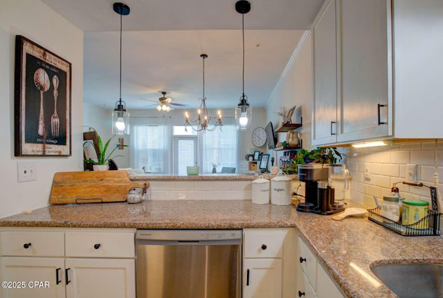 kitchen featuring ceiling fan, dishwasher, hanging light fixtures, light stone countertops, and white cabinets