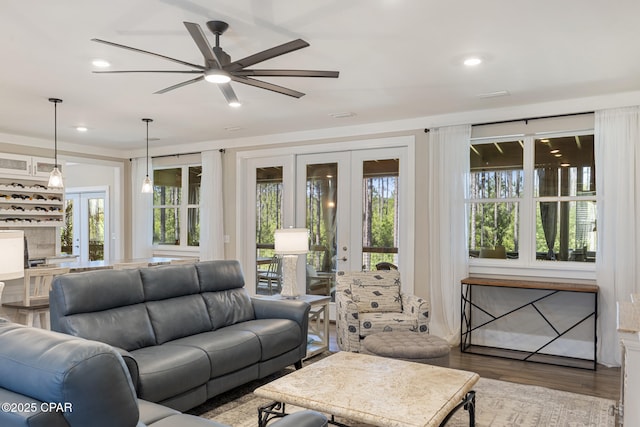6509 W Sundew Marsh Trl, Panama City Beach, FL 32413 - living room with french doors, a ceiling fan, wood finished floors, and recessed lighting