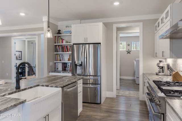 6509 W Sundew Marsh Trl, Panama City Beach, FL 32413 - kitchen featuring appliances with stainless steel finishes, a sink, open shelves, white cabinetry, and dark wood finished floors