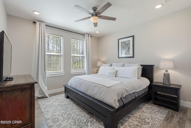 6509 W Sundew Marsh Trl, Panama City Beach, FL 32413 - bedroom with baseboards, wood finished floors, ceiling fan, and recessed lighting