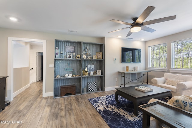 6509 W Sundew Marsh Trl, Panama City Beach, FL 32413 - living area featuring ceiling fan, wood finished floors, baseboards, and recessed lighting