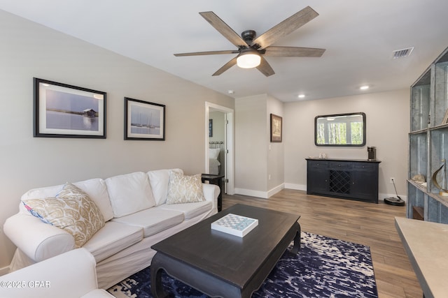 6509 W Sundew Marsh Trl, Panama City Beach, FL 32413 - living area with a ceiling fan, wood finished floors, baseboards, and recessed lighting