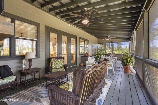 6509 W Sundew Marsh Trl, Panama City Beach, FL 32413 - sunroom with french doors, a ceiling fan, and beamed ceiling