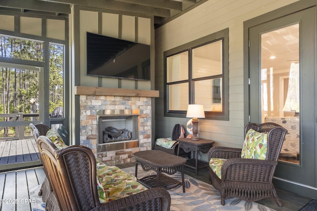 6509 W Sundew Marsh Trl, Panama City Beach, FL 32413 - wooden deck with an outdoor living space with a fireplace