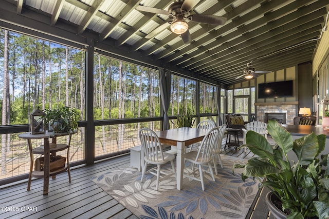 6509 W Sundew Marsh Trl, Panama City Beach, FL 32413 - sunroom with healthy amount of natural light and vaulted ceiling