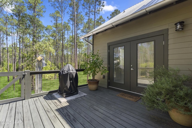 6509 W Sundew Marsh Trl, Panama City Beach, FL 32413 - wooden deck featuring french doors