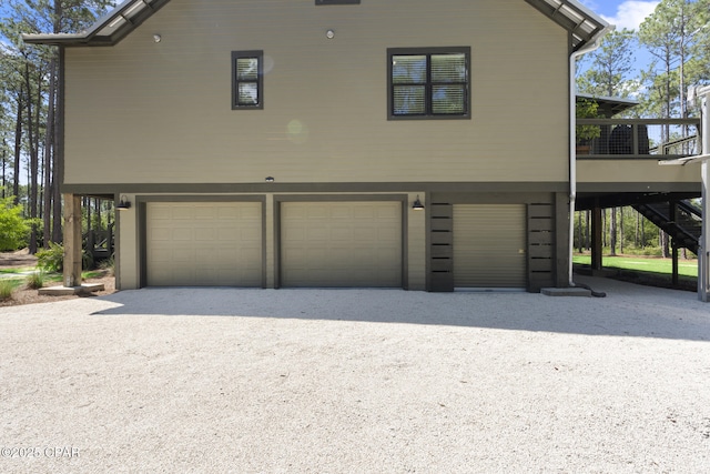 6509 W Sundew Marsh Trl, Panama City Beach, FL 32413 - view of home's exterior with a garage and stairway
